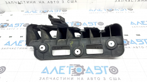 The right rear bumper mount under the headlight of a Chevrolet Volt 16-19 is broken.