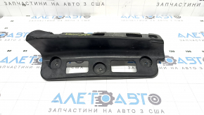 The right rear bumper mount under the headlight of a Chevrolet Volt 16-19 is broken.