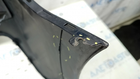 The rear bumper is bare and upper, Chevrolet Volt 16-19, black, with broken fasteners.