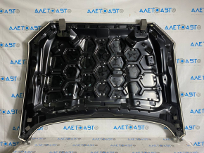 The hood of a Ford Fusion mk5 13-20 steel, China, is dented and dented.