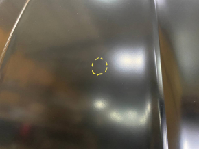 The hood of a Ford Fusion mk5 13-20 steel, China, is dented and dented.