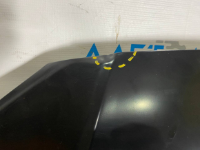 The hood of a Ford Fusion mk5 13-20 steel, China, is dented and dented.