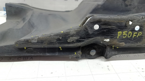 The right side engine protection of a Toyota Prius 50 16-18 is worn, torn, and dented.