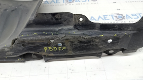 The right side engine protection of a Toyota Prius 50 16-18 is worn, torn, and dented.