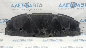 The front bumper guard of a Toyota Prius 50 16-18 is worn, torn, and dented.