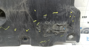 The front bumper guard of a Toyota Prius 50 16-18 is worn, torn, and dented.