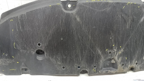 The front bumper guard of a Toyota Prius 50 16-18 is worn, torn, and dented.