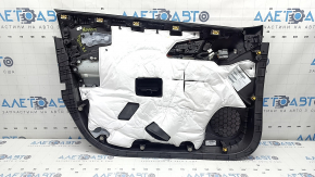 The front right door panel of the Chevrolet Volt 16 is black, with a black leather insert, the armrest is black leather, with a handle, without a cover and buttons, scratches