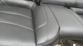 Chevrolet Volt 16-18 rear seat cushion, black leather with blue stitching, perforated, dents