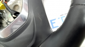 The steering wheel is bare, Chevrolet Volt 16-19, black leather, with buttons, paddle shifters, and heating. The coating is peeling, there are scratches, and scuffs.