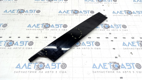 The front left side door trim for a Porsche Macan 15-26 is worn.