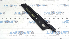 The front left side door trim for a Porsche Macan 15-26 is worn.