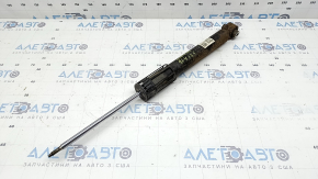 The rear left shock absorber for a VW Tiguan 18-24 AWD is rusty.
