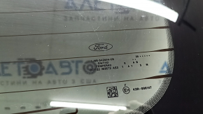 The tailgate is bare with glass, Ford Escape MK4 20-22 silver UX, bumps, and worn glass.