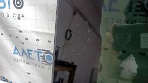 Hyundai Tucson 22-26 central panoramic glass with scratches, soot, and corrosion