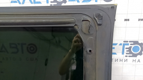 Hyundai Tucson 22-26 central panoramic glass with scratches, soot, and corrosion