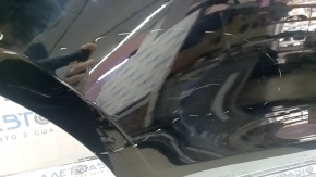 The bare rear right door of a Porsche Macan 15-18, black A1, painted 0.25-0.3, with a bump, scratches, and chips.