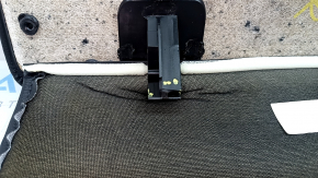 Black rear passenger seat trim for a 1920 Porsche Macan, broken mount