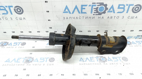 The front left shock absorber for a Chevrolet Volt 16 is rusty.