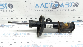 The front right shock absorber for a Chevrolet Volt 16 is rusty.