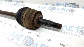 The front right half shaft of a Chevrolet Volt 16-19 is thin and rusty.