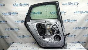 Rear left door assembly for Audi A4 B9 17-19 silver LZ7G, keyless, painted 0.15, bumps, dent