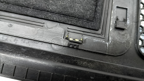 The plastic windshield wiper grille for an Audi A6 C8 19-24 has broken fasteners.