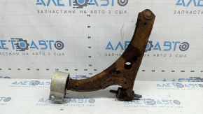 Lower front right control arm of Chevrolet Volt 16 - microcracks, rusty