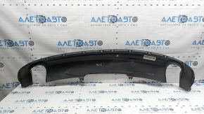 The rear bumper lip of the Audi A4 B9 17-18 s-line is matte and dented.