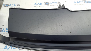 The rear bumper lip of the Audi A4 B9 17-18 s-line is matte and dented.