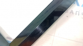 Volvo XC60 18-26 front panel trim, glossy black, scratches