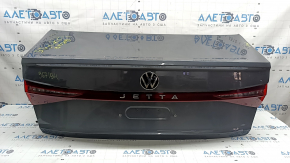 Complete trunk lid for VW Jetta 25-26, graphite LD7X, with taillight, trim, bump stops, lock, emblem, handle and camera, scratches