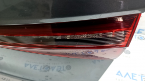 Complete trunk lid for VW Jetta 25-26, graphite LD7X, with taillight, trim, bump stops, lock, emblem, handle and camera, scratches