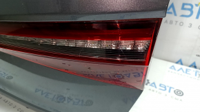 Complete trunk lid for VW Jetta 25-26, graphite LD7X, with taillight, trim, bump stops, lock, emblem, handle and camera, scratches