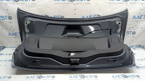 Complete trunk lid for VW Jetta 25-26, graphite LD7X, with taillight, trim, bump stops, lock, emblem, handle and camera, scratches