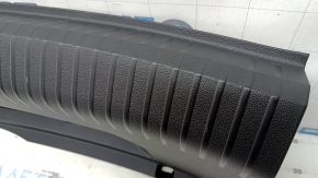VW Jetta 19-26 trunk opening trim, black, scratches
