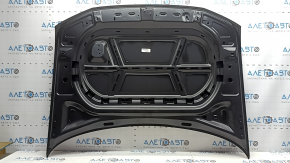 The hood is bare, Volkswagen Atlas 18-20 steel, the corners are dented.