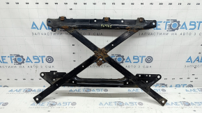 The front subframe strut bar of a Porsche Macan 15-26 is rusty.