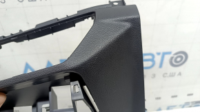 VW Jetta 19-26 black lower dash trim with scratches