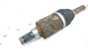 The rear left half shaft of a Ford Escape MK4 20-26 is rusty, the outer CV joint is defective, and the boot is torn.