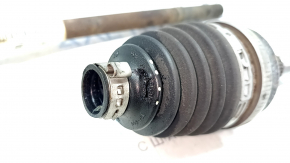 The rear left half shaft of a Ford Escape MK4 20-26 is rusty, the outer CV joint is defective, and the boot is torn.