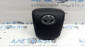 The driver's steering wheel airbag for a Toyota Prius 50 16-22 is black and has a rusty squib.
