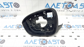 The left side mirror housing is bare, Mitsubishi Outlander 22-26, black, the fasteners are broken.