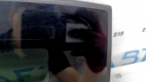The front panoramic glass of a Hyundai Tucson 22-26 has a torn seal, a chip, and a worn coating.