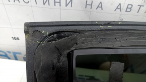The front panoramic glass of a Hyundai Tucson 22-26 has a torn seal, a chip, and a worn coating.
