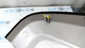 The interior mirror cover for the Audi A6 C8 19-25 is gray and has broken fasteners.