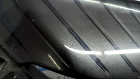 The radiator grille of the Toyota Venza 21-24 is cracked and chipped.