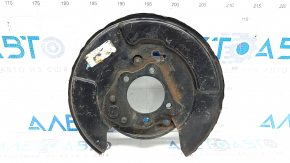 The rear left brake disc cover of a Toyota Camry v55 15-17 USA is dented.
