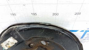 The rear left brake disc cover of a Toyota Camry v55 15-17 USA is dented.