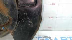 The rear left brake disc cover of a Toyota Camry v55 15-17 USA is dented.